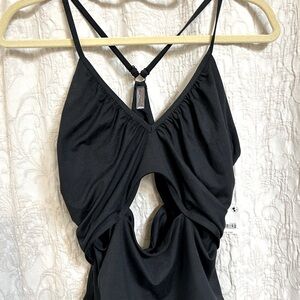 NWT FP Movement: Soft fabric; Cut out’s; mesh detail; scoop neckline; shelf bra.